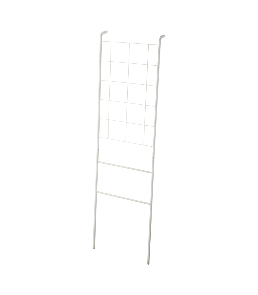 View 1 - Leaning Ladder with Grid Panel on a blank background.