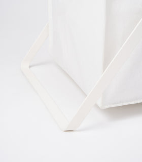 Photo showing part of the base of the large Laundry Hamper with Cotton Liner by Yamazaki Home in white. view 18