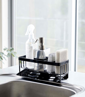Black steel sponge and soap bottle holder with black draining tray. view 11