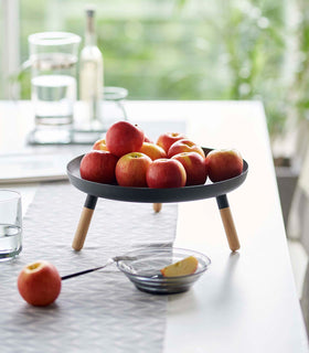 Black Yamazaki Countertop Pedestal Tray with apples on top view 12