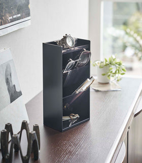 black Yamazaki Home Accessory Organizer holding accessories such as pens and a watch view 9
