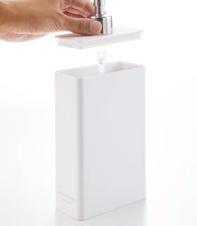 Side view of white Conditioner Dispenser with top off on white background by Yamazaki Home. view 13
