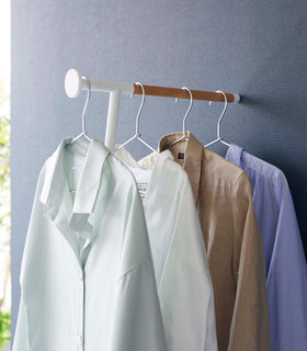 Collared shirts hung on white Yamazaki Home Clothes Steaming Leaning Pole Hanger view 4