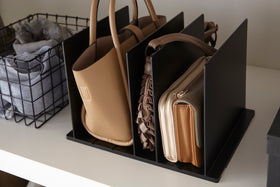 Black Bag Organizer with Customizable Dividers holding purses by Yamazaki Home. view 9