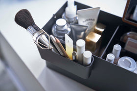 Close up aerial view of black Makeup Organizer containing makeup products by Yamazaki Home. view 11