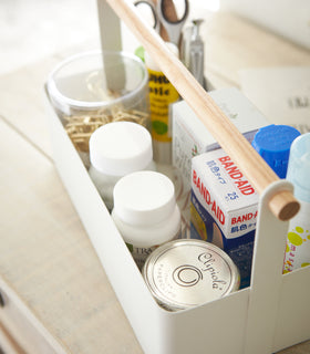 Aerial view of white Storage Caddy holding first-aid materials by Yamazaki Home. view 4