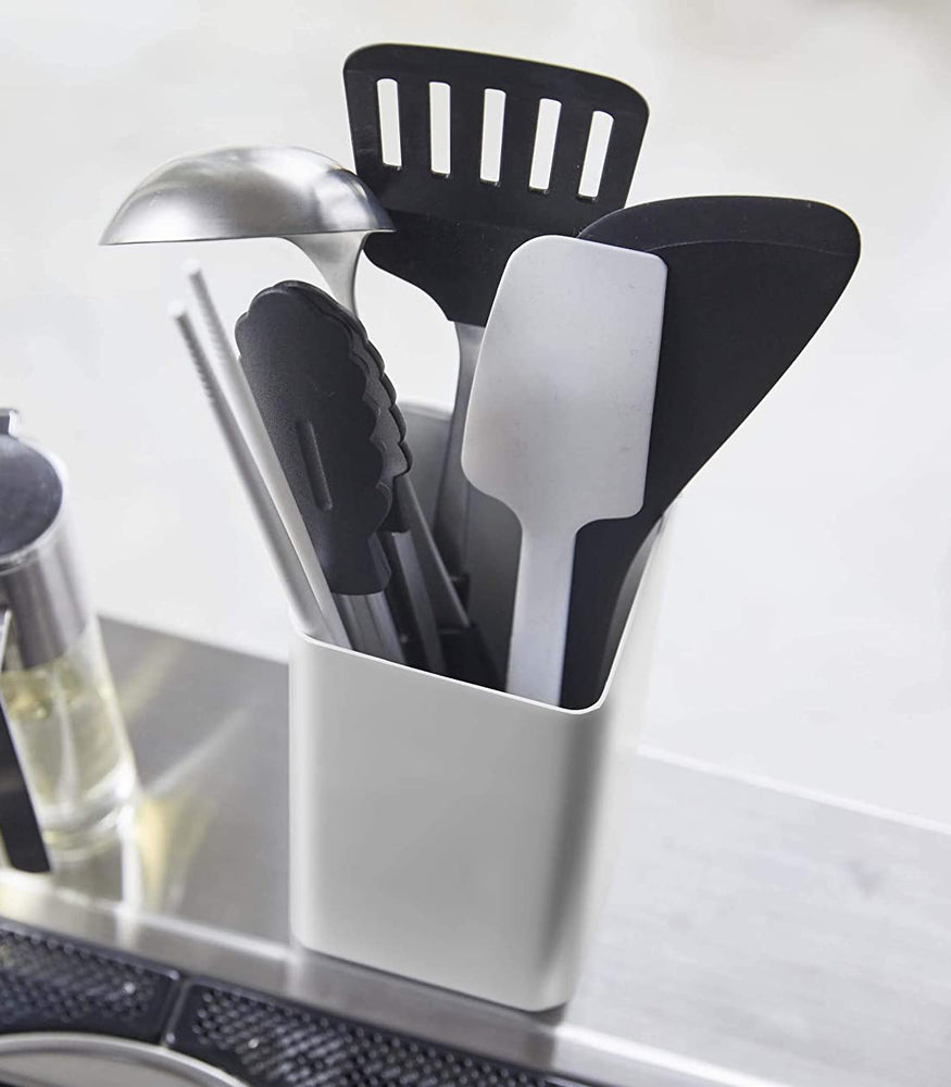 View 4 - White Utensil Holder holding kitchen utensils on countertop by Yamazaki Home.