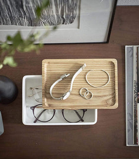 Aerial view of white Accessory Box with Wood Lid displaying sunglasses, watch, and rings by Yamazaki Home. view 5