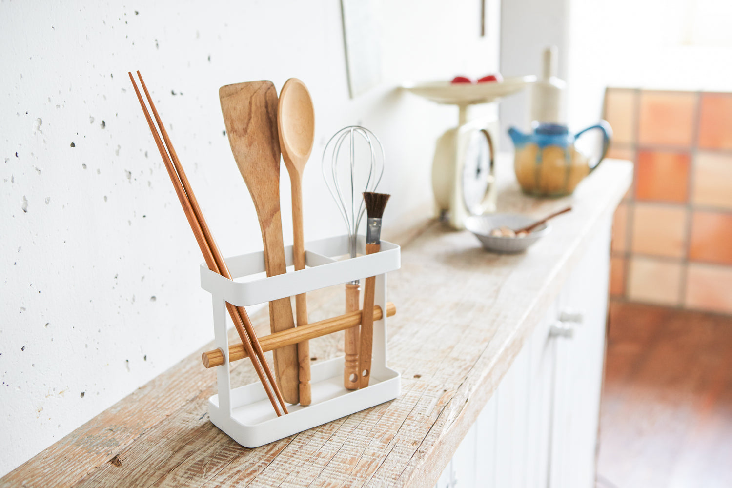 View 4 - Utensil holder holding kitchen utensils on shelf by Yamazaki Home.