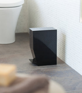 Side view of black Step Trash Can in bathroom by Yamazaki Home. view 11