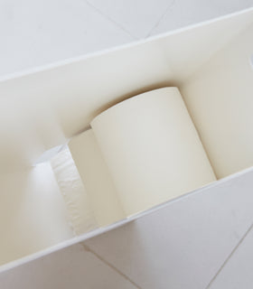 Aerial view inside white Toilet Paper Stocker holding toilet paper rolls by Yamazaki Home. view 5