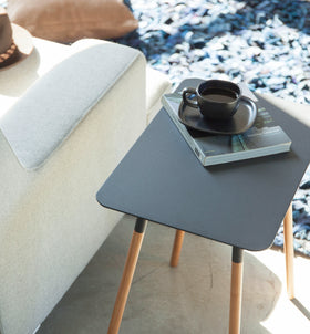 Aerial view of black Side Table displaying coffee cup and book in living room by Yamazaki Home. view 8