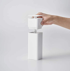 Front view of white One-Handed Push Soap Dispenser with top removed on white background by Yamazaki Home. view 5