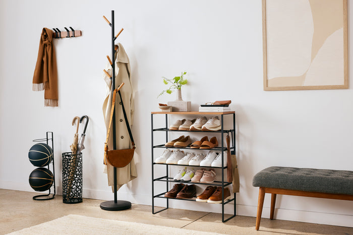 Home entryway with umbrella stand, six-tier shoe rack, and coat hanger