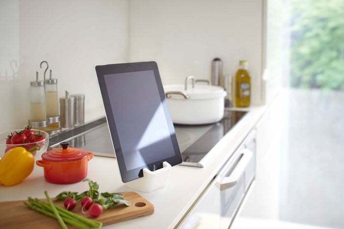 Yamazaki Home Tablet stand holding a tablet on the kitchen countertop.