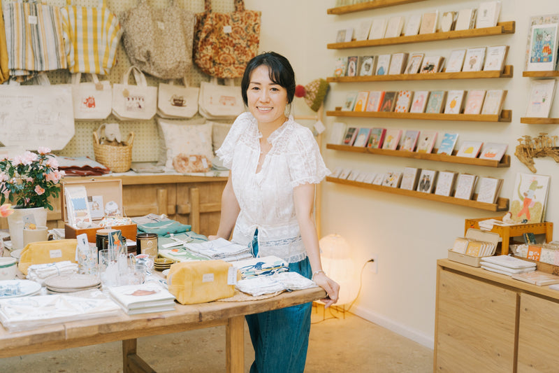 Siming Vautin poses inside Loaf on Paper cafe in Williamsburg for Yamazaki Home Spotlight Series