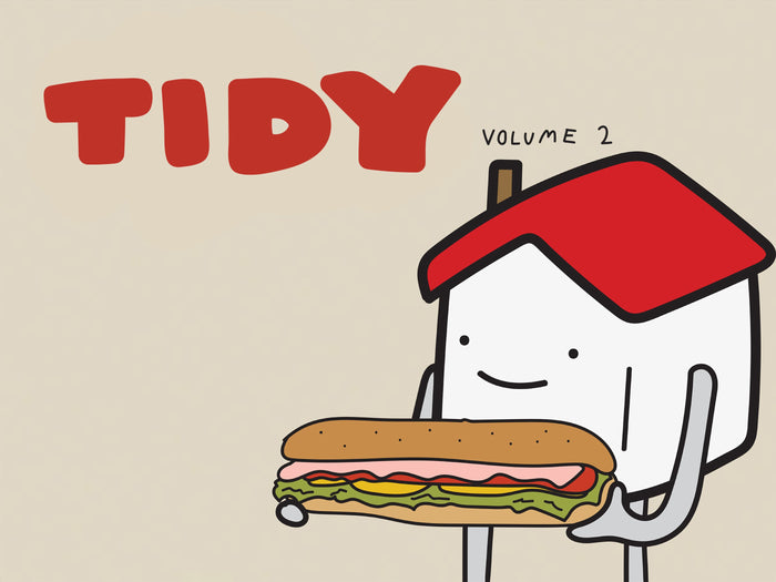 Tidy, the Yamazaki Home mascot, holding a foot-long sandwich. He is smiling. Text reads Tidy Volume 2