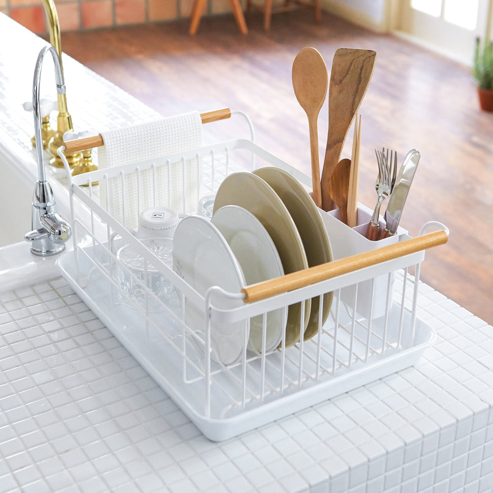 Yamazaki Home Dish Riser in small and large holding plates on a shelf.