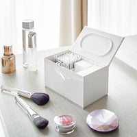 Yamazaki Home make up organizer holding cotton pads. 