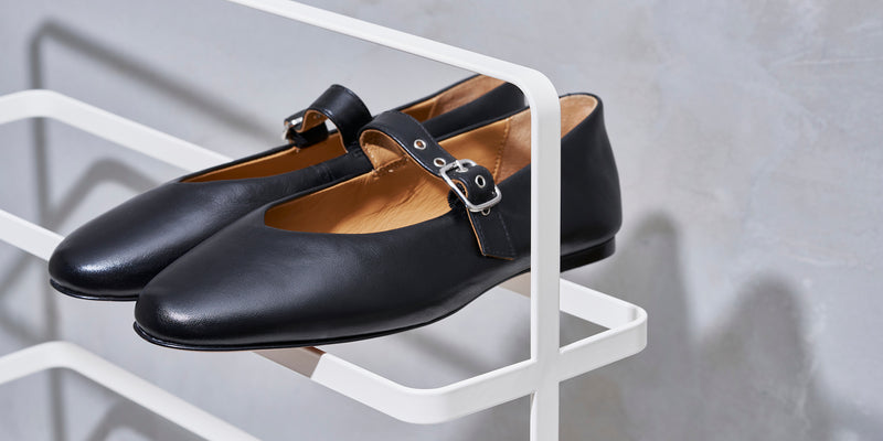 Shoe Rack with black leather mary jane ballet flats. White steel design. Yamazaki Home website Cover image 