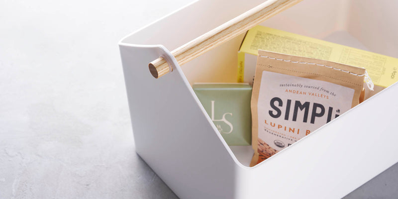 Storage caddy holding snacks and crackers