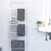 Yamazaki Home white leaning ladder in bathroom