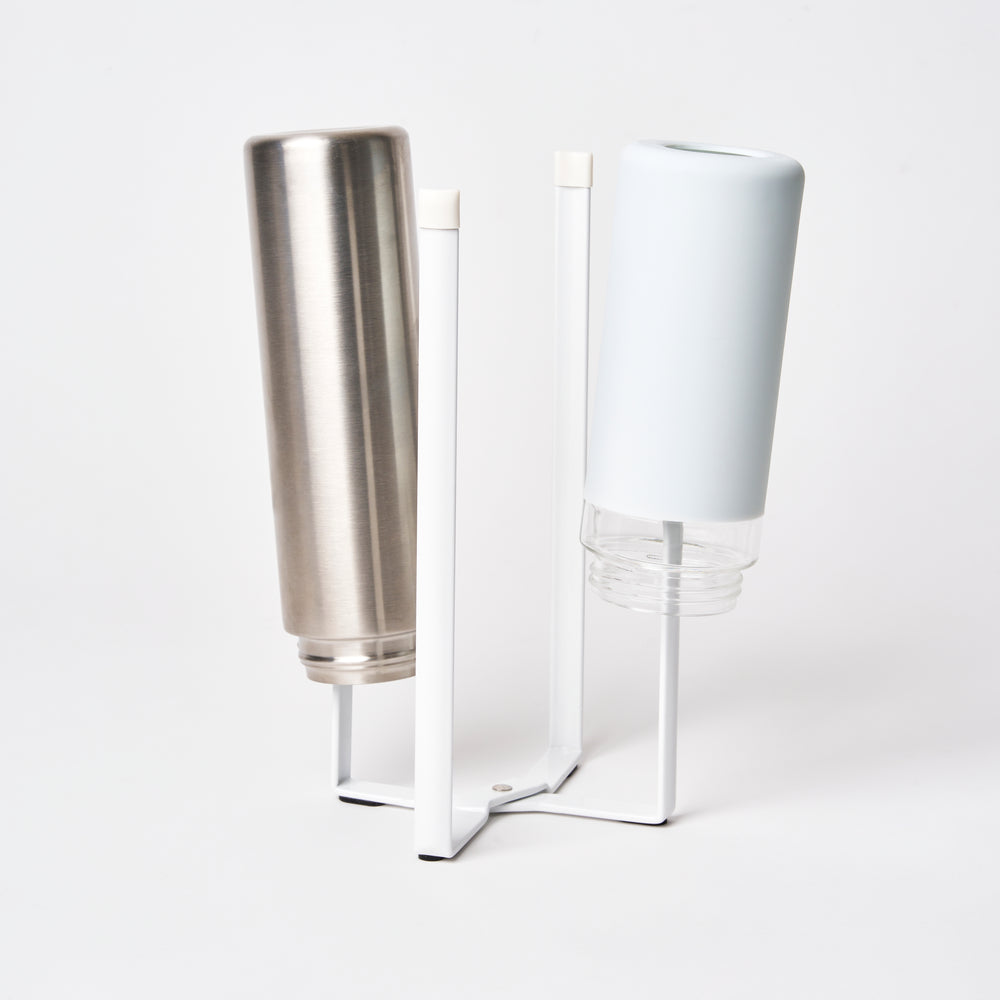 Yamazaki Home White Collapsible Bottle Dryer - Steel with props on the white background 
