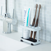 Yamazaki Home toothbrush stands on bathroom countertop