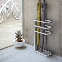 Yamazaki Home umbrella stands holding two umbrellas