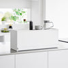 White Yamazaki Home Front-Opening Kitchen Countertop Storage Rack on a kitchen counter closed