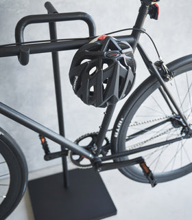 Close up of helmet stored on Yamazaki Home Bicycle Stand view 6