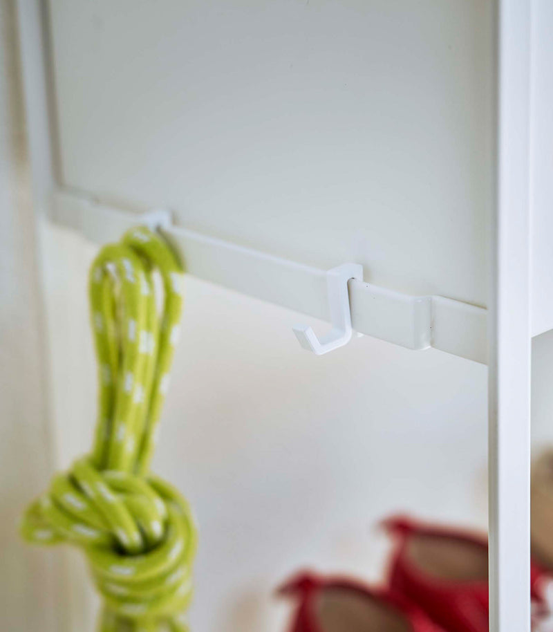 Close up of hooks on white Yamazaki Entryway Organizer