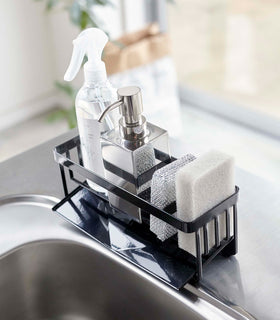 Black steel sponge and soap bottle holder with black draining tray. view 10