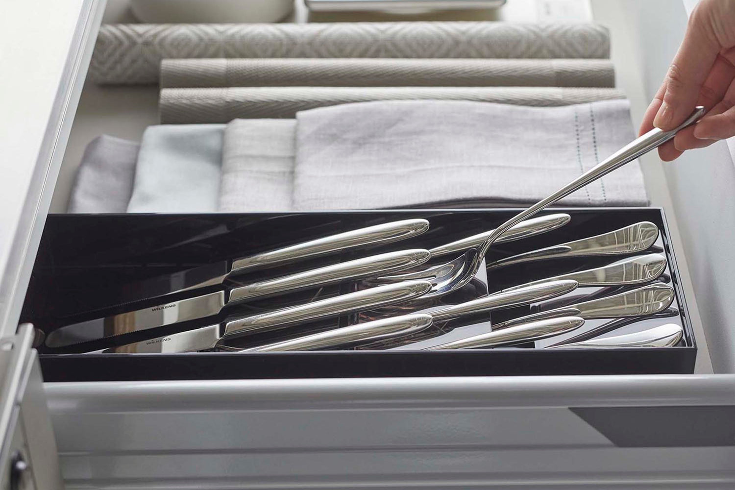 View 10 - Close up side view of black Cutlery Storage Organizer holding silverware by Yamazaki Home.