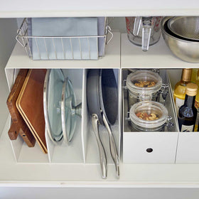 Yamazaki White Under-Cabinet Storage Shelves holding kitchen essentials. view 7