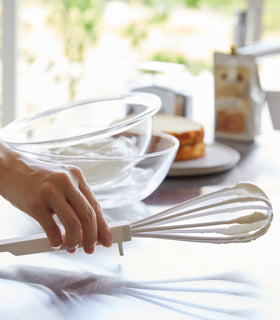 A white Yamazaki Floating whisk with meringue on it after whisking. view 7