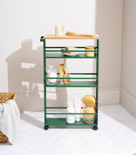 Forest Green Yamazaki Home Slim Storage Cart with bathroom accessories view 4