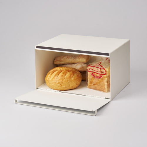White Tower bread box by Yamazaki Home with bread stored inside.