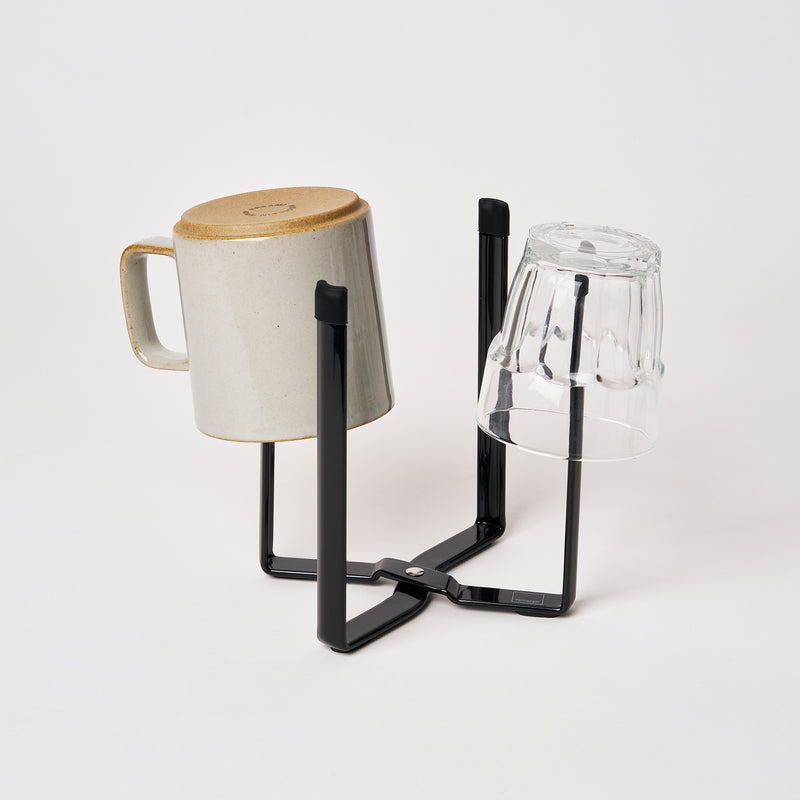 Yamazaki Home Collapsible Bottle Dryer - Small with props, set against a white background.