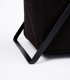 Photo showing part of the base of the large Laundry Hamper with Cotton Liner by Yamazaki Home in black. view 13