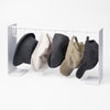 Yamazaki Home Hat Hanging Organizer with props, set against a white background.