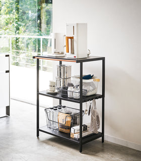 Black Storage Rack holding coffee and brewing appliances by Yamazaki Home. view 8