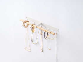 White Undershelf Hangers in kitchen holding towel and bag by Yamazaki Home. view 7