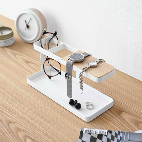Angled view of White Desk Organizer - Steel holding glasses, a bracelet, and a watch on the desk
