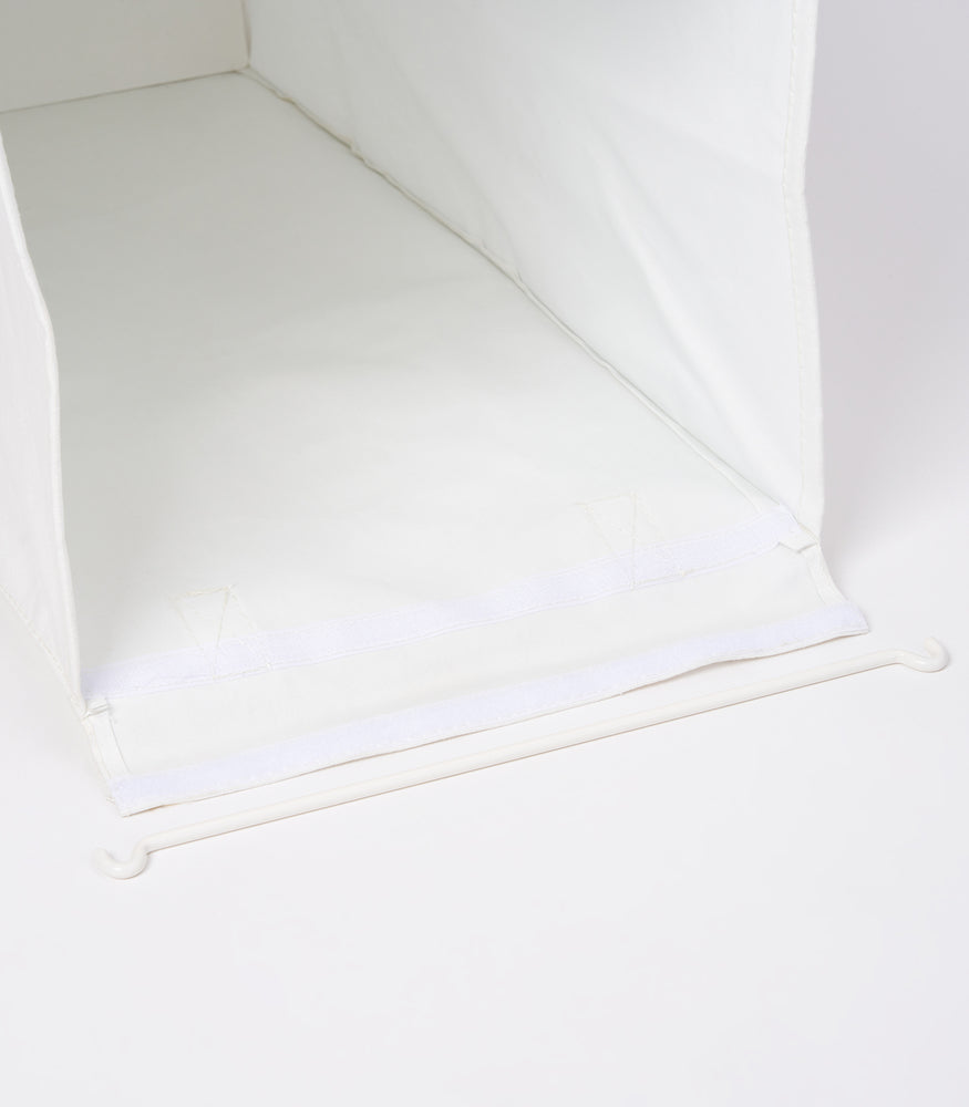 View 7 - Image showing the velcro fixture on the small Laundry Hamper with Cotton Liner by Yamazaki Home in white on a white background.