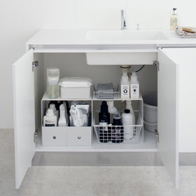Yamazaki White Under-Cabinet Storage Shelves holding bathroom essentials. view 4