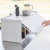 Side view of white Yamazaki Home Front-Opening Kitchen Countertop Storage Rack being opened
