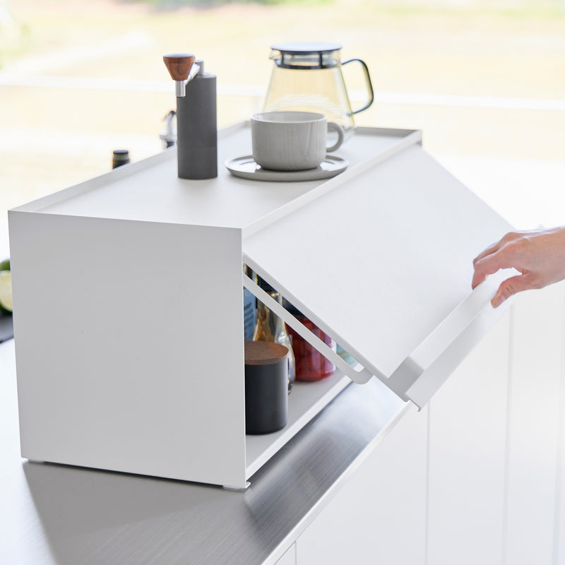 Side view of white Yamazaki Home Front-Opening Kitchen Countertop Storage Rack being opened