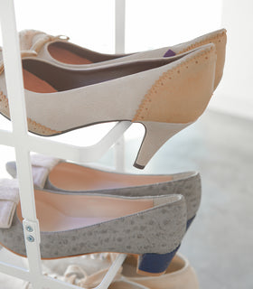 Side view of heels on white Shoe Rack by Yamazaki home. view 5