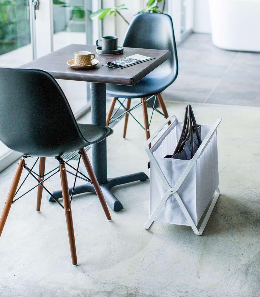 View 6 - White Storage Hamper holding bag by Yamazaki Home.